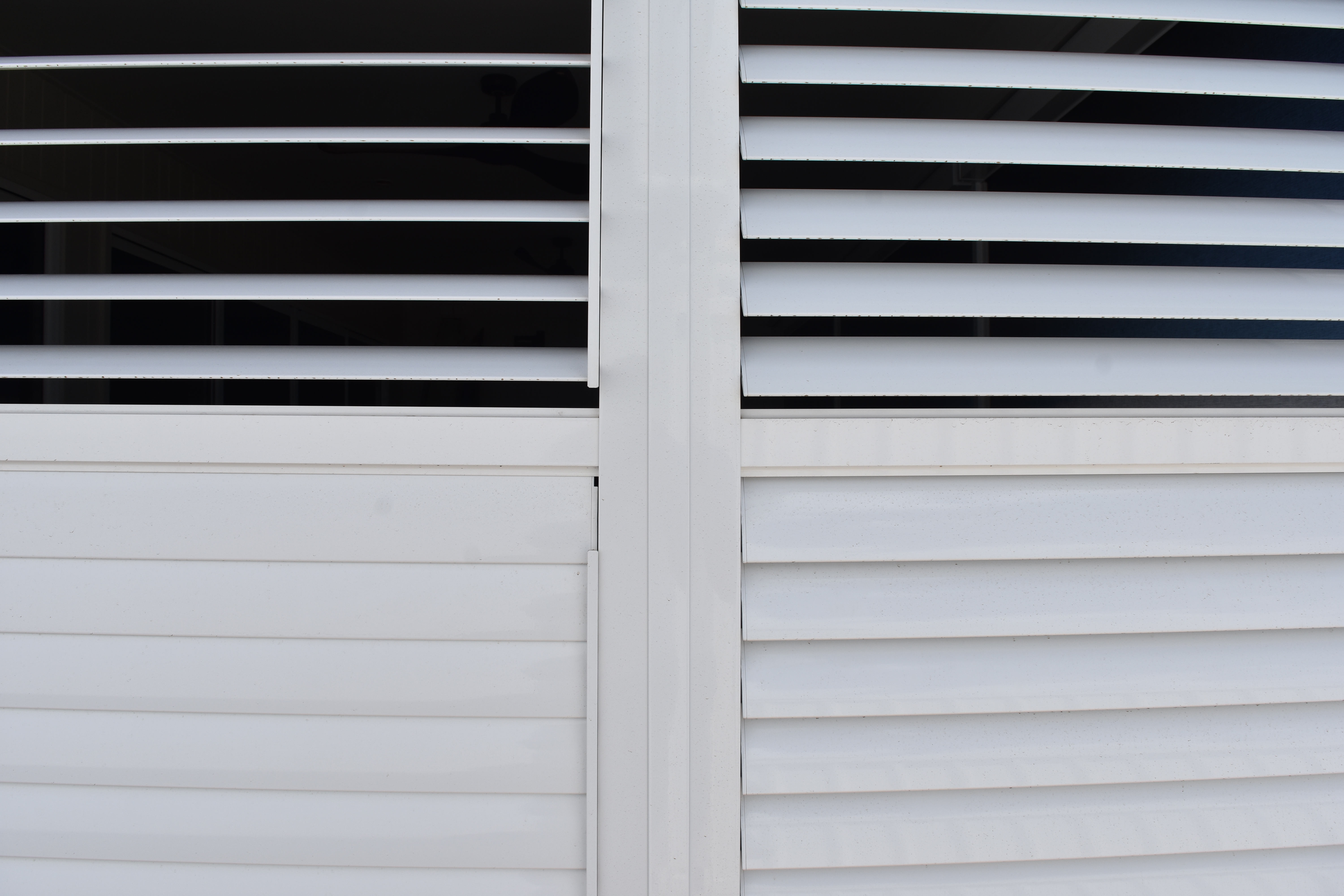 Plantation shutters providing light control