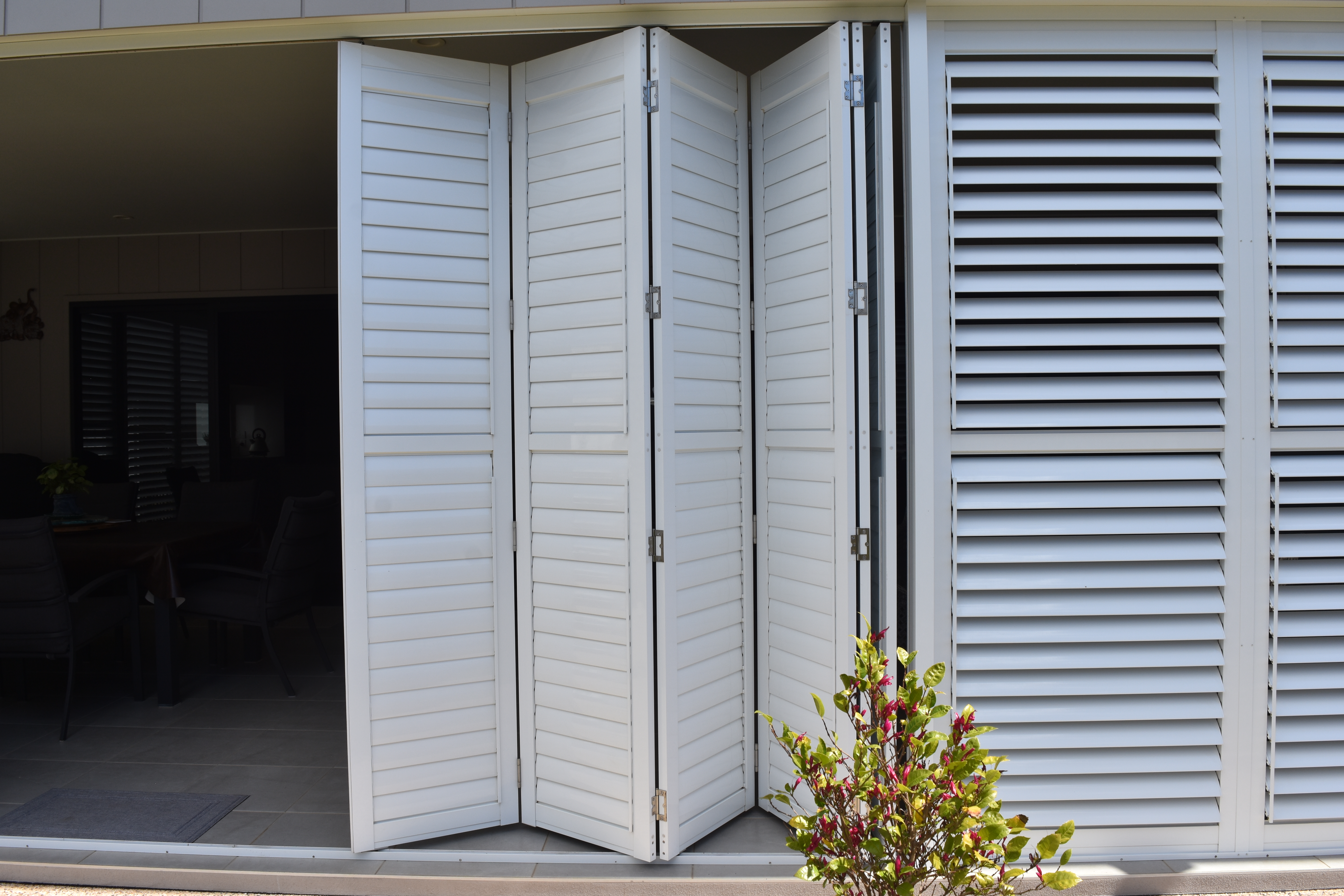 Plantation shutters fitted to bi-fold doors